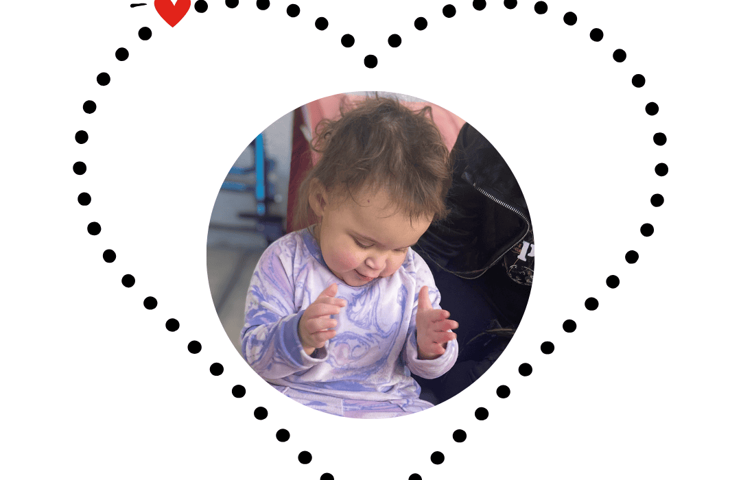 Image shows a dotted heart with a circular image of Chevelle in it. In the upper right corner of the heart, a dot is replaced with a red heart. In white letter, image reads "Chevelle" at the top and in braille at the bottom.